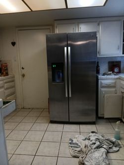 Kenmore side by side stainless steel refrigerator