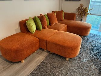 Pending-Modular sectional sofa with pillows