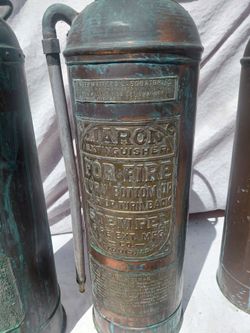 Vintage copper fire extinguishers