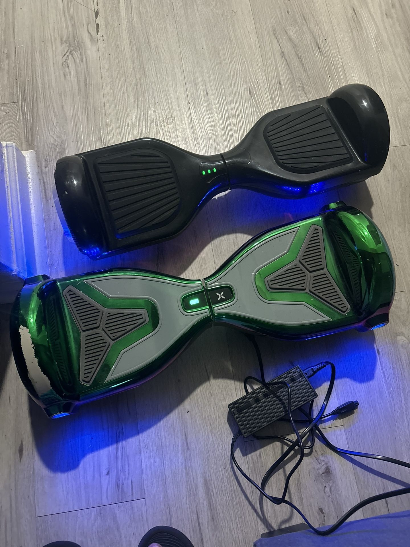 1 Rainbow Chrome Hoverboard, 1 Black Hoverboard