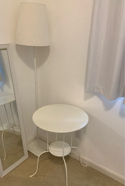 IKEA white table and lamp