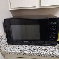 Big Nice SHARP BRAND MICROWAVE.  WORKS GREAT.  PAID 120. SELLING FOR 40