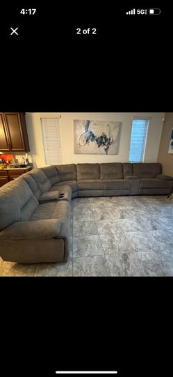 Beautiful, Gray elegant luxury, all electric powered large, plush sectional sofa