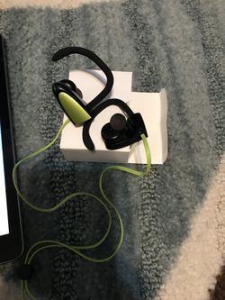 Green ear buds