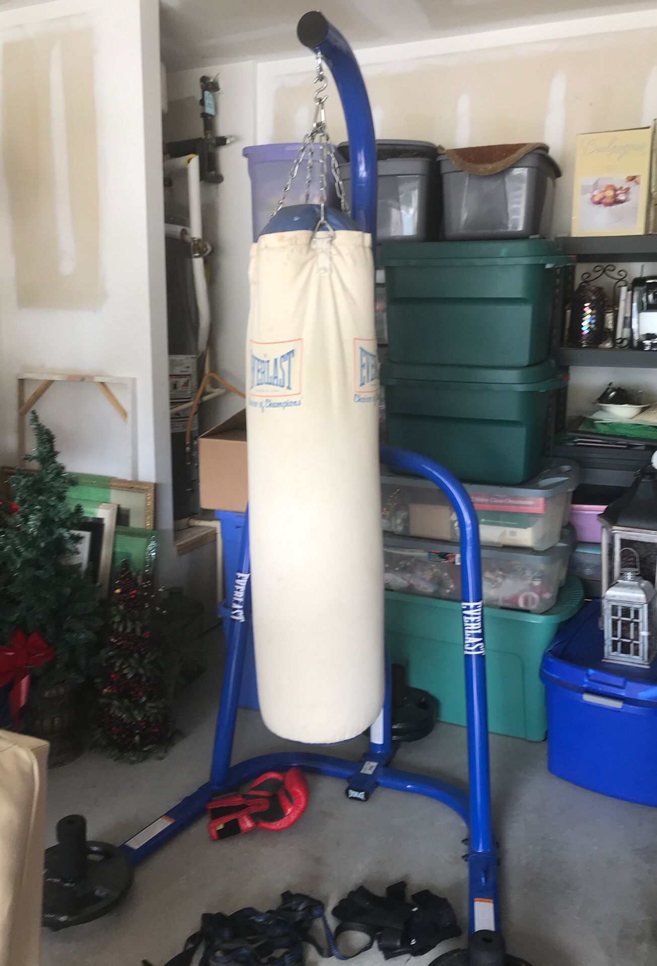 Punching bag with stand and gloves