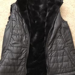 Small Sleeveless Jacket with Fur Inside.
