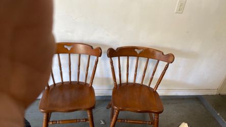 Two Wooden Chairs.