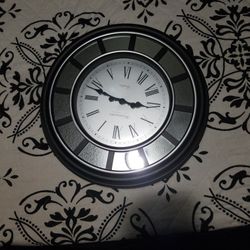 Black And Silver Clock