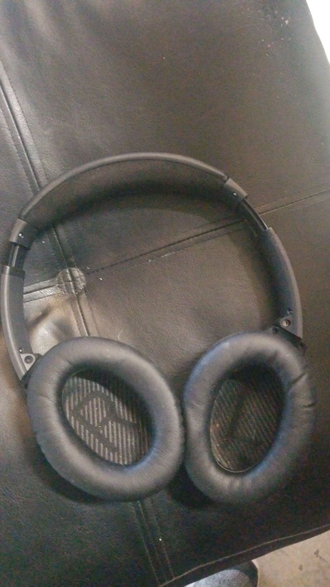 Bose quiet comfort 2 noise canceling headphones.