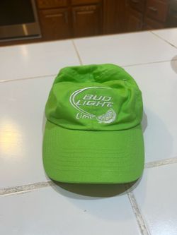 light green cotton baseball cap embroidered with the white and green Bud Light Lime logo and a lime slice on the front