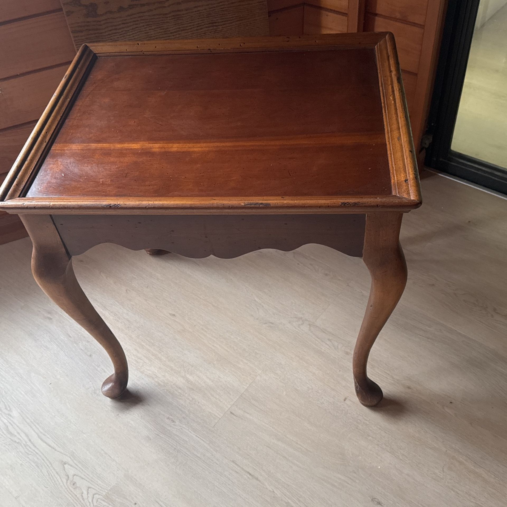 An antique wood table, solid wood , 26x21