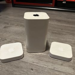 Apple Airport Extreme and 2 Airport Express