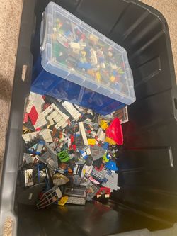Lots of authentic Lego. Roughly 20 pounds or more.