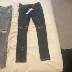 Two Pair Of Purple Jeans