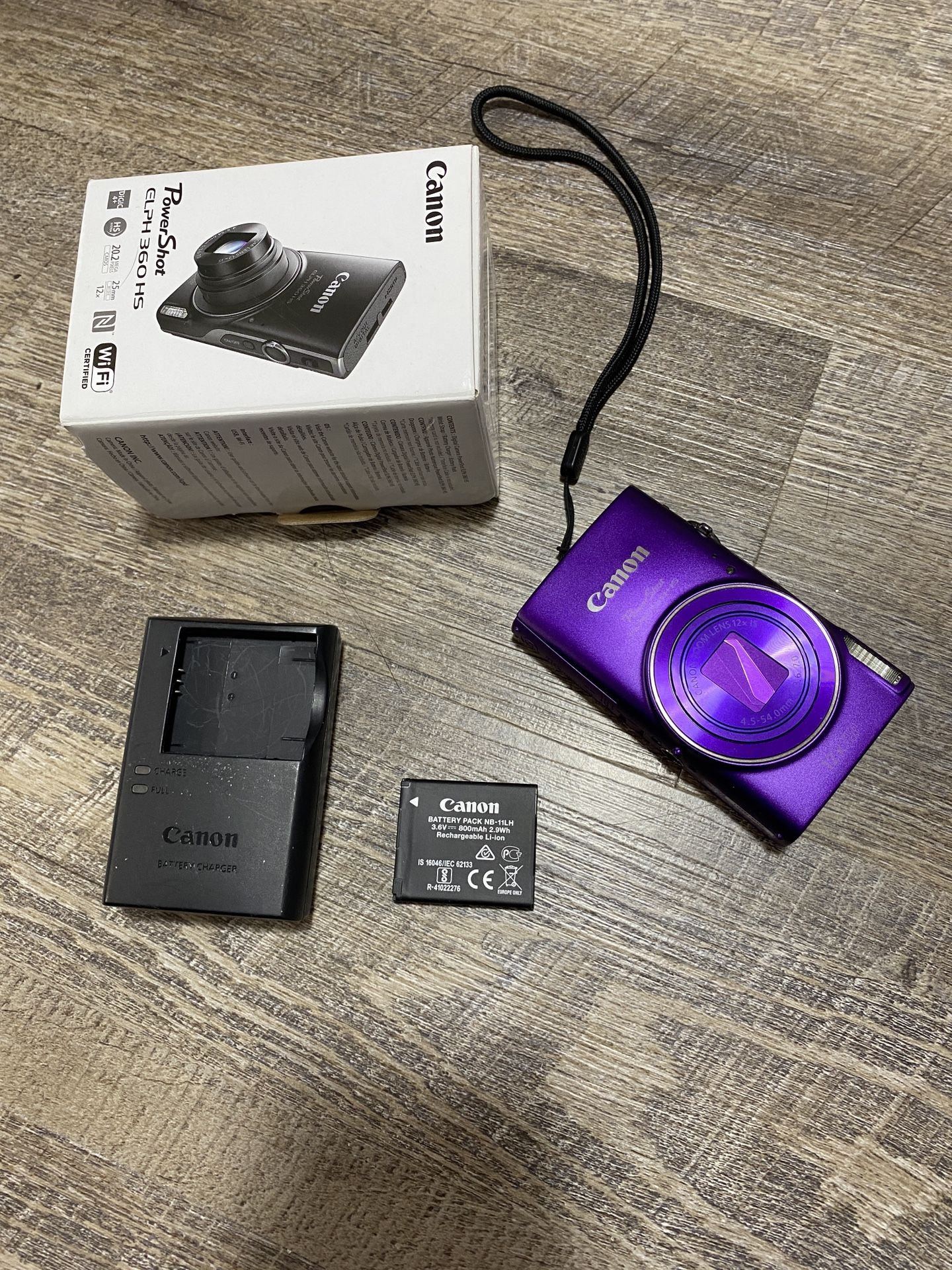 Canon Powershot ELPH 360 Digital Camera 12x Optical Zoom And WiFi (purple)