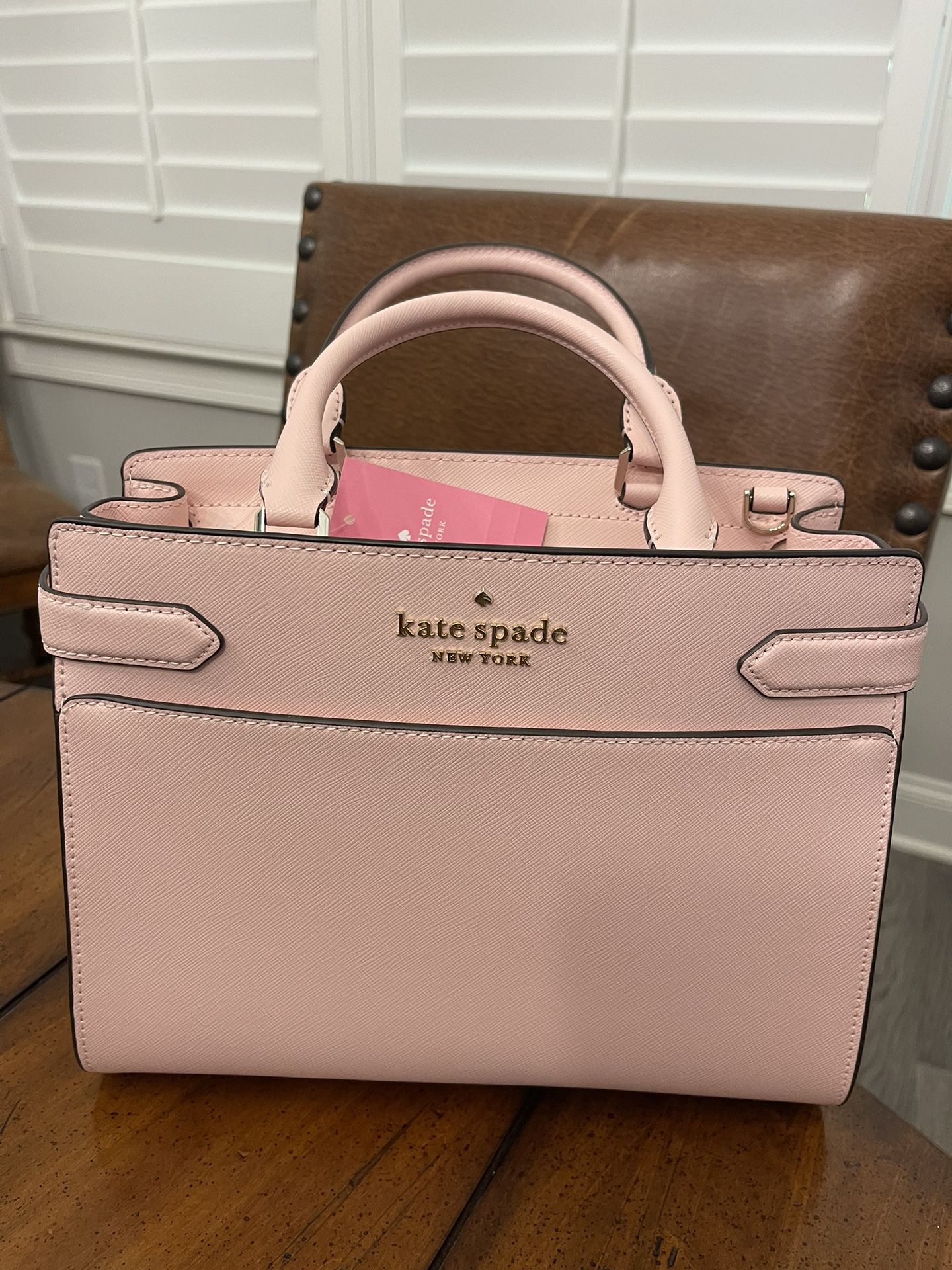 Brand new Kate spade bag. Bag is medium satchel in chalk pink. Comes from a smoke free home.