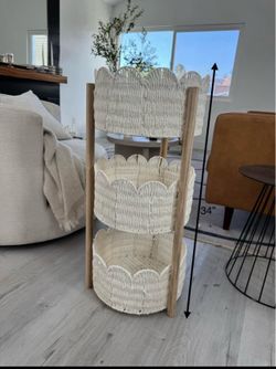 Three-tiered storage baskets