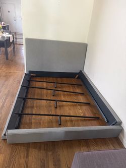 Living Spaces Queen Upholstered Panel Bed