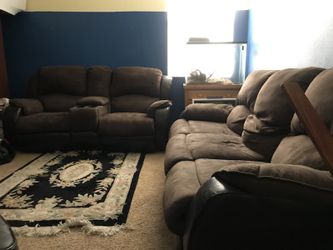Two reclining movie room couches need gone today!