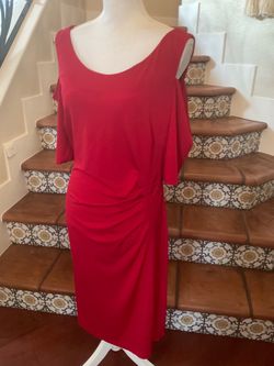 Red polyester & spandex midi dress with side ruching . Beautiful Dress is size 16.