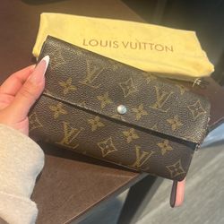 Louis Vuitton Wrist wallet 