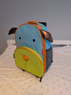 Skip Hop dog rolling suitcase.
