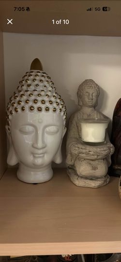 Zen Buddhas $25 & Up. Candle Holder $25. 2 Ceramic Buddha Heads $50. Green Statue $75. Antique Lamp & Tiffany Slag Glass Shade $200. 2 Tall Gray $160.