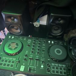 pioneer dj deck with pioneer speakers and headset 
