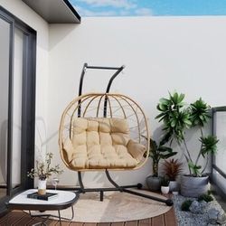 ES292 $155  PamaPic Swing Chair Rattan Black Iron Frame Hanging Egg Chair with Brown Cushioned Seat  Product Overview  Spacious and comfortable: This 