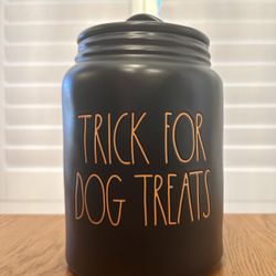 $22….New Rae Dunn matte black dog treats canister / orange writing- TRICK FOR DOG TREATS.  Measures approx 9” x 6” D.  Please pickup in the area of 36