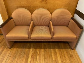 Office waiting room chairs and three wooden chairs.
