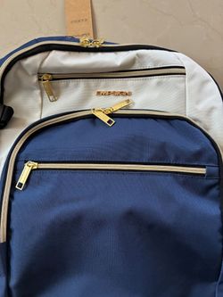 Empsign 40L travel backpack in a white and blue colorway featuring gold-tone zippers and multiple organizational compartments.