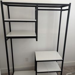 Free standing and Modern style clothes rack w/ shelves