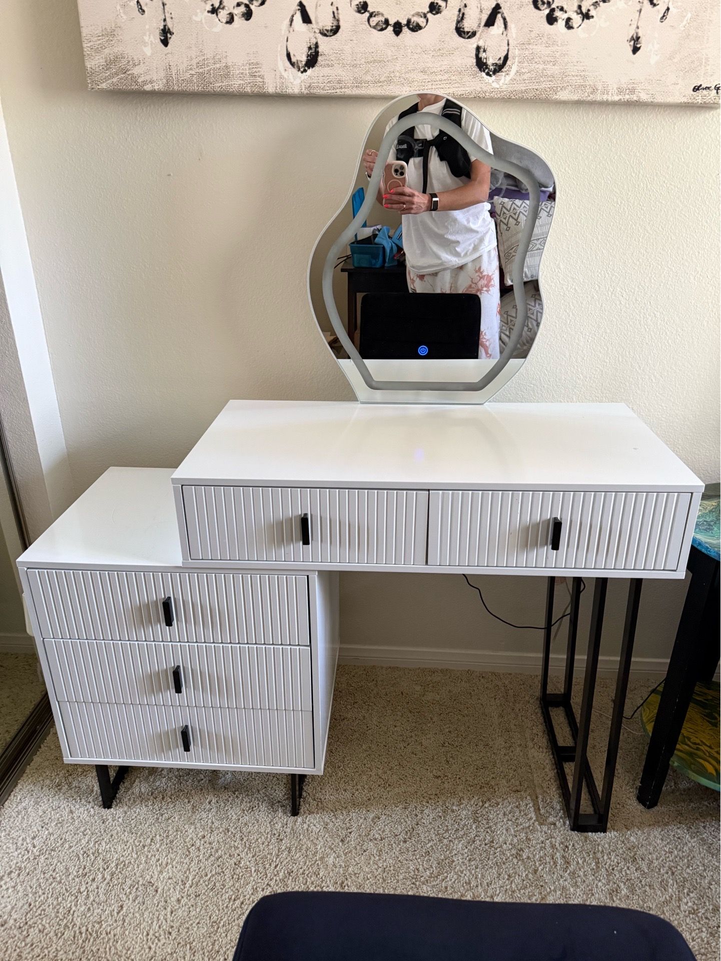 White vanity with velour chair