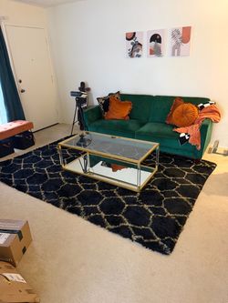 Black and gold geometric rug 8x10’