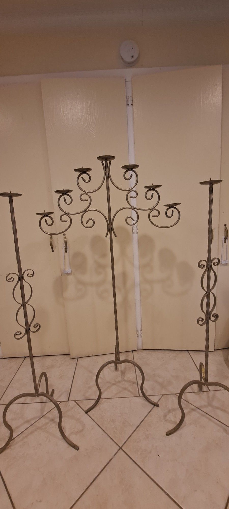 Candle Holders "Great Prop For Many Occasions"  Slightly Heavy. Will Not Fall Over.
