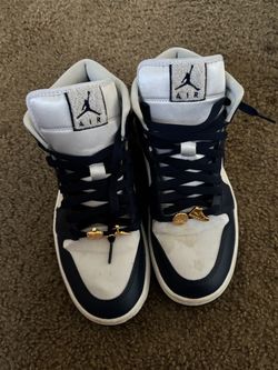 Jordan Retro 1’s Navy Blue w/ Gold Charms.