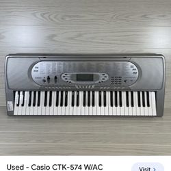 Used - Casio CTK-574 W/AC Keyboard 61-Key