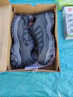 Sketchers steel toe shoes, ( never worn, in box )