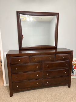 Dark Wood Dresser with matching mirror  & 9 drawers