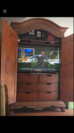 Wood armoire great condition wood tv not for sale