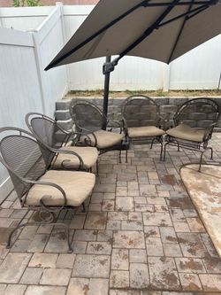 5 Iron rocking chairs