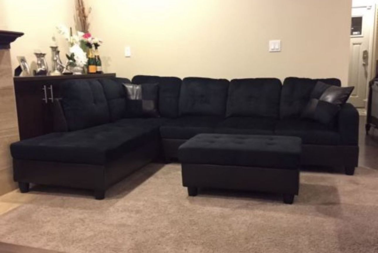 Black microfiber sectional couch and ottoman
