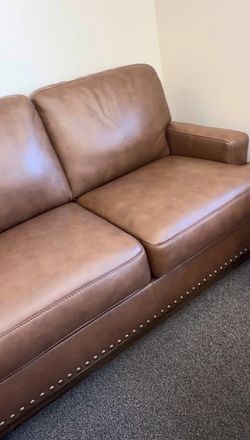 Quality Leather Sofa and Loveseat with Bronze Detailing - No Credit Needed