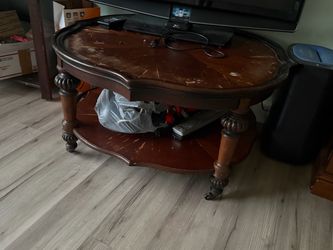 Wood Oval Coffee Table with Casters