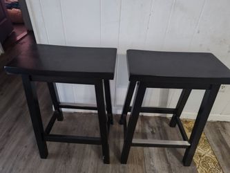 Two brown stools