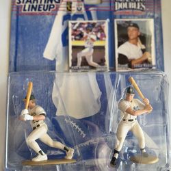 1997 Starting Lineup Classic Doubles action figure set featuring Mark McGwire (Oakland A's) and Roger Maris (New York Yankees).