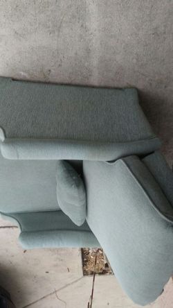 Sage green recliner chair. .