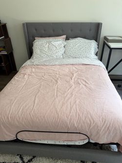 Queen bed with recliner and upholstery frame