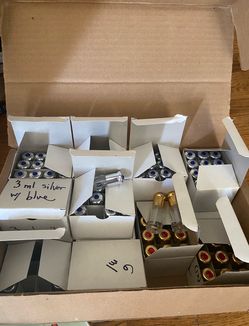 Unused clean Moroccan glass perfume bottles with plastic caps